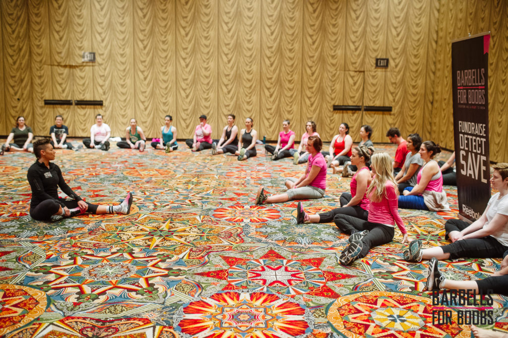 Zionna leading a group stretch.